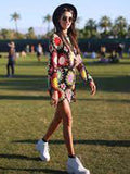 Colorful Long Sleeves Mini Dress Cover-Ups Swimwear worn by a model at a beach event, showcasing a vibrant pattern and stylish look.