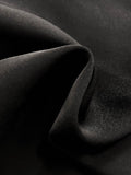 High Waisted Wide Leg Pants fabric detail showcasing soft black polyester material.