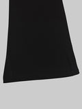 Close-up of High Waisted Wide Leg Pants hem showing sleek design and fabric texture.