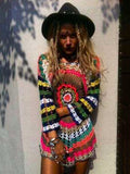 Colorful Long Sleeves Mini Dress Cover-Ups Swimwear worn by a model with long hair and hat against a textured wall.