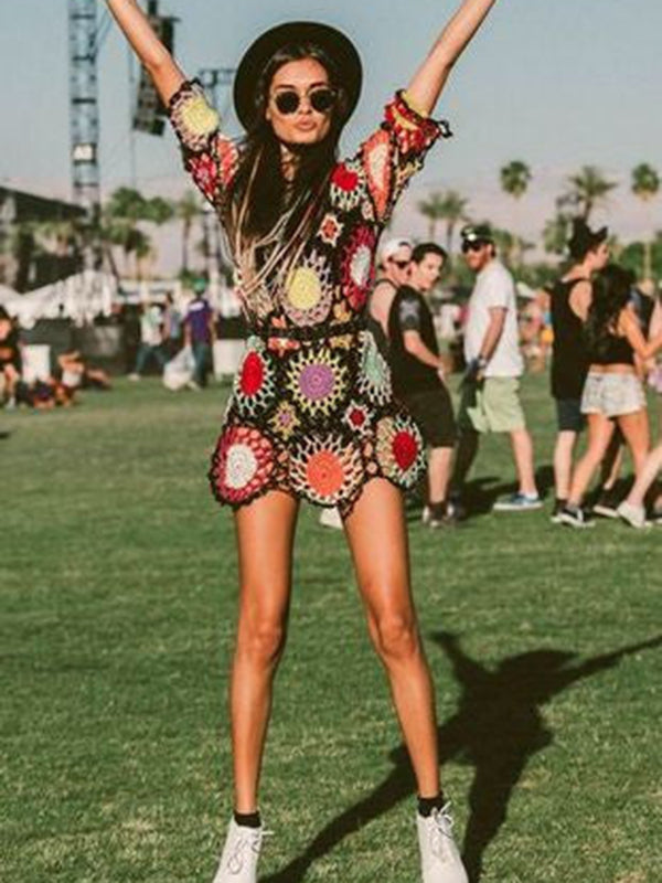A model in a Colorful Long Sleeves Mini Dress Cover-Ups Swimwear with sunglasses, posing at an outdoor festival.