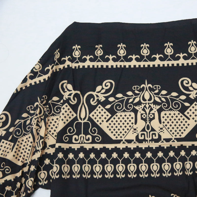 Off Shoulder Geometric Print Puff Sleeve Top featuring a black and beige geometric design.